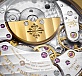 World Time yellow gold 02